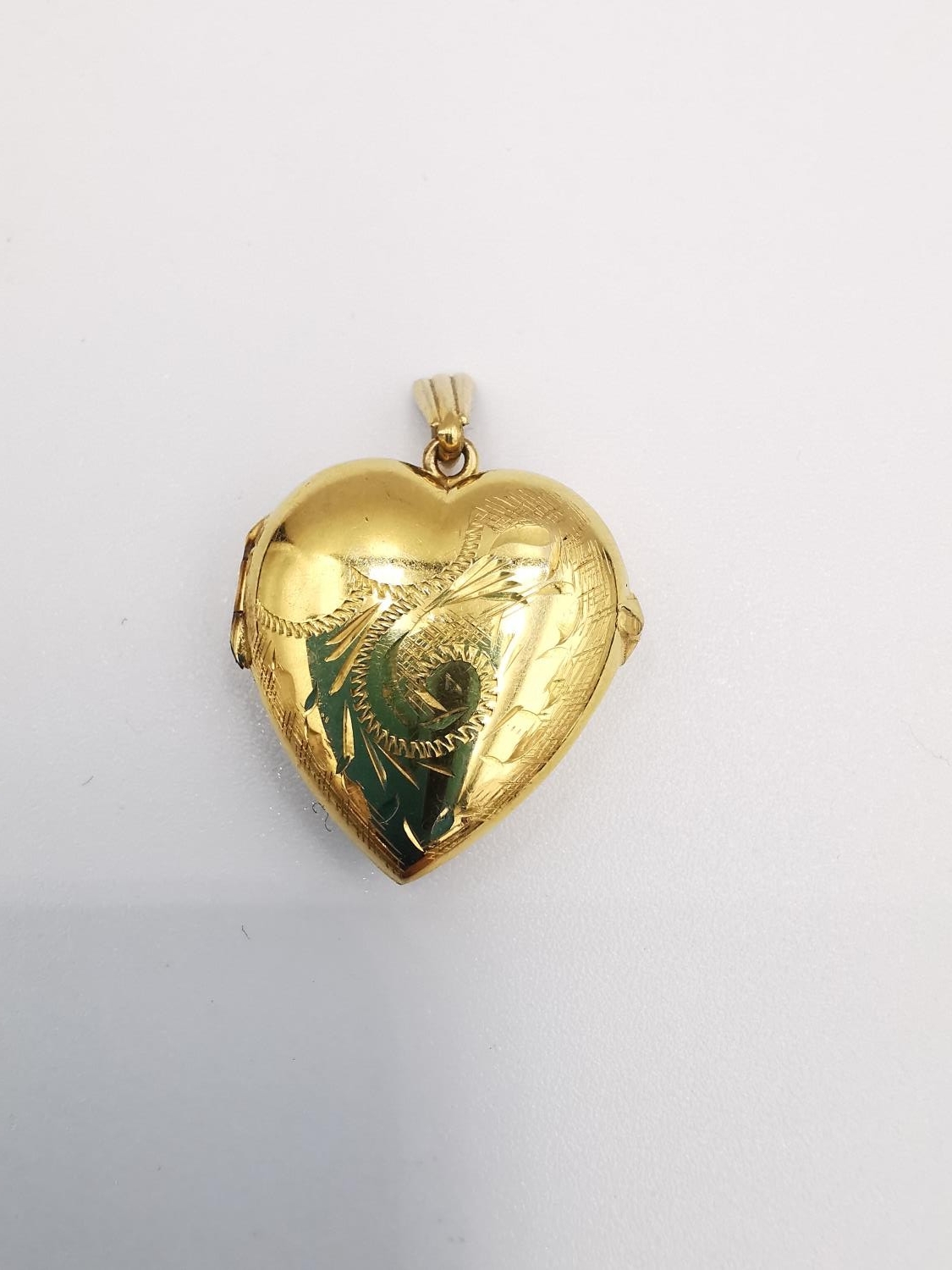 Two engraved 9ct yellow gold lockets. One heart shaped by Georg Jensen with a stylised scrolling - Image 5 of 7