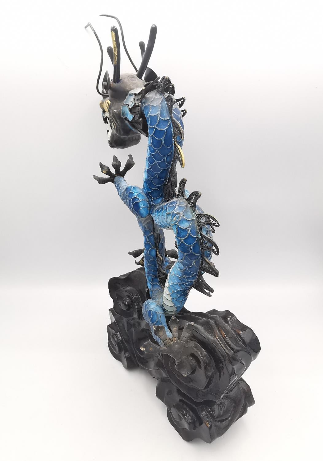 An early 20th century Chinese white metal and cloisonne enamel wirework dragon on a carved cloud - Image 8 of 9