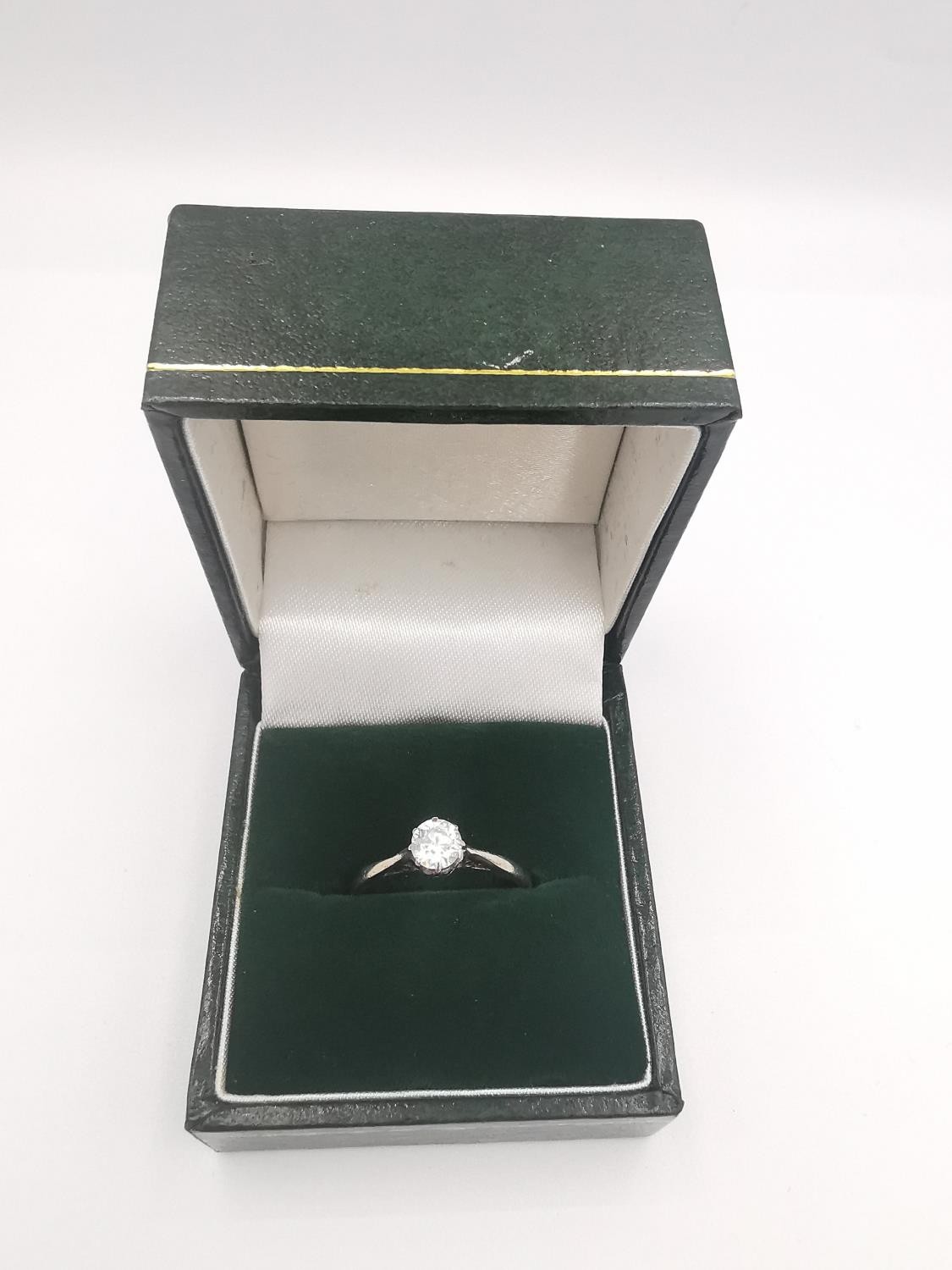 A boxed 18ct carat white gold diamond solitaire ring. The ring set with a round old cut diamond with - Image 3 of 5