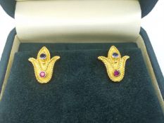 A boxed set of 18ct yellow gold ruby and sapphire stud earrings by Greek fine jewellers