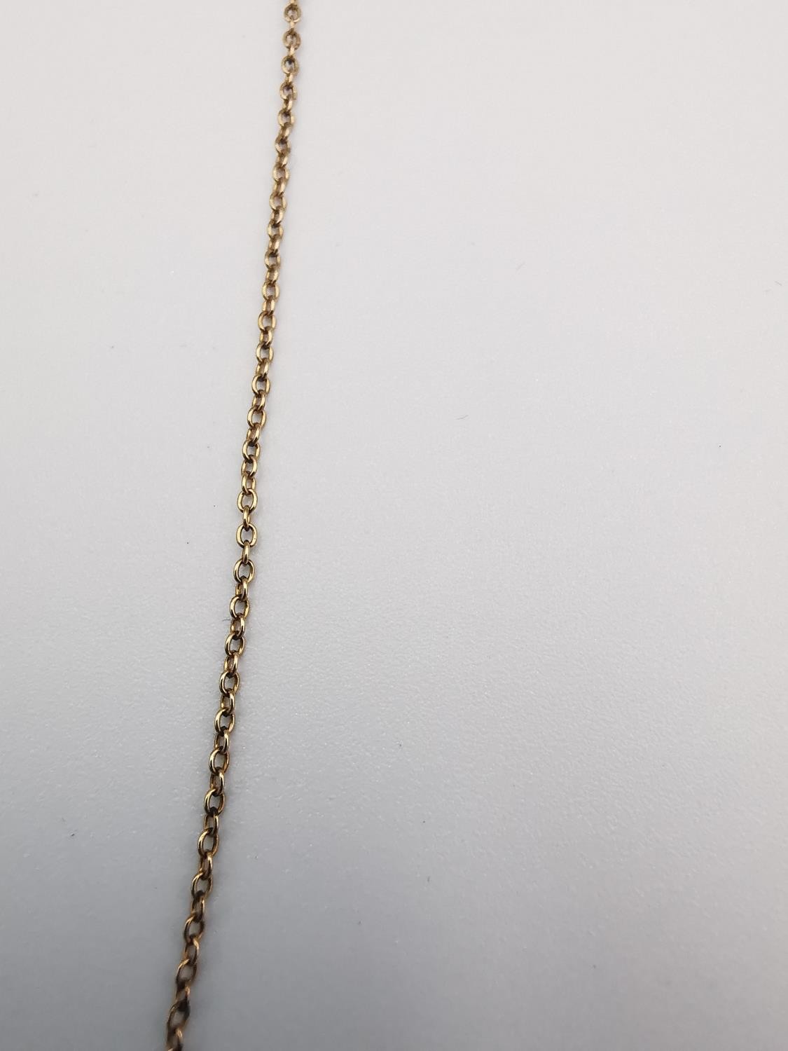 A 9ct yellow gold fine trace chain along with a yellow metal trace chain and 9ct yellow gold - Image 4 of 7