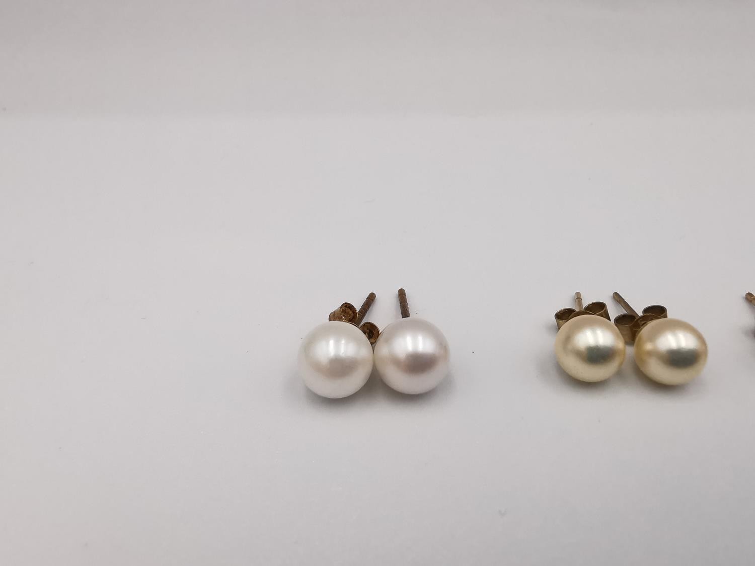 Four pairs of round cultured pearl stud earrings, three pairs with 9ct posts and butterflies. One - Image 2 of 7