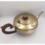 An Art Deco silver teapot with Bakelite handle and finial. Hallmarked: H&H for Hukin & Heath Ltd,