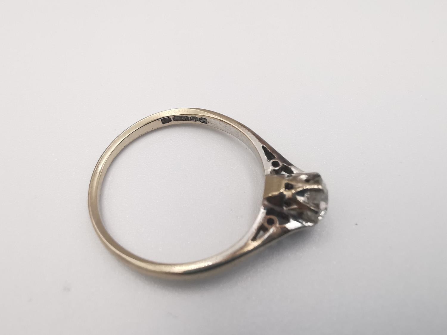 A boxed 18ct carat white gold diamond solitaire ring. The ring set with a round old cut diamond with - Image 5 of 5