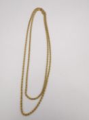 An 18ct yellow gold twist rope chain with lobster clasp. Hallmarked:18KT, Italy, 750. L.64cm