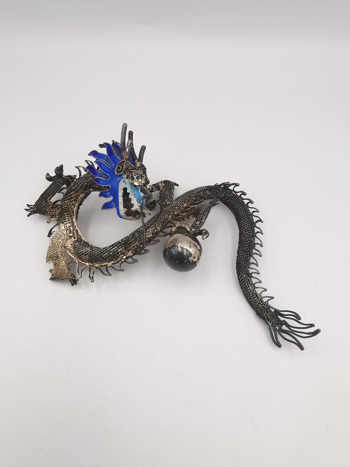 Two mid 20th century Chinese enamel and white metal filigree wirework dragons. Decorated with pale - Image 3 of 5