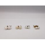 Four pairs of round cultured pearl stud earrings, three pairs with 9ct posts and butterflies. One