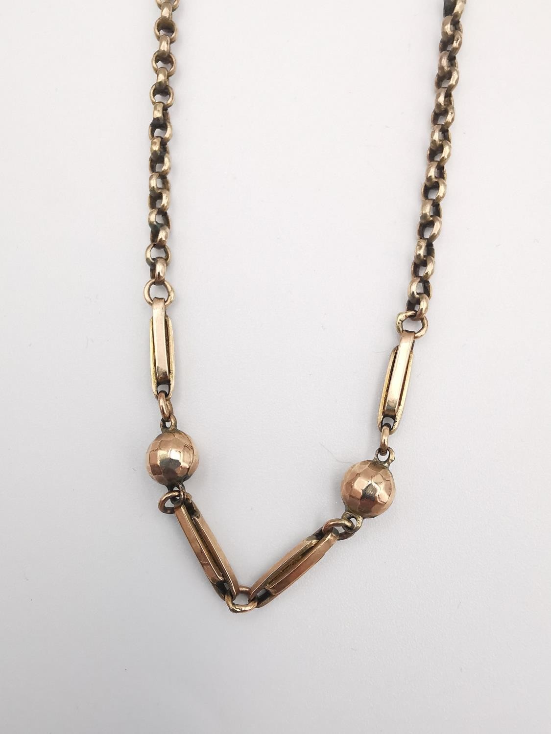 A Victorian 9ct rose gold chain with ball and bar design to the front, the rest of the chain rolo - Image 2 of 5