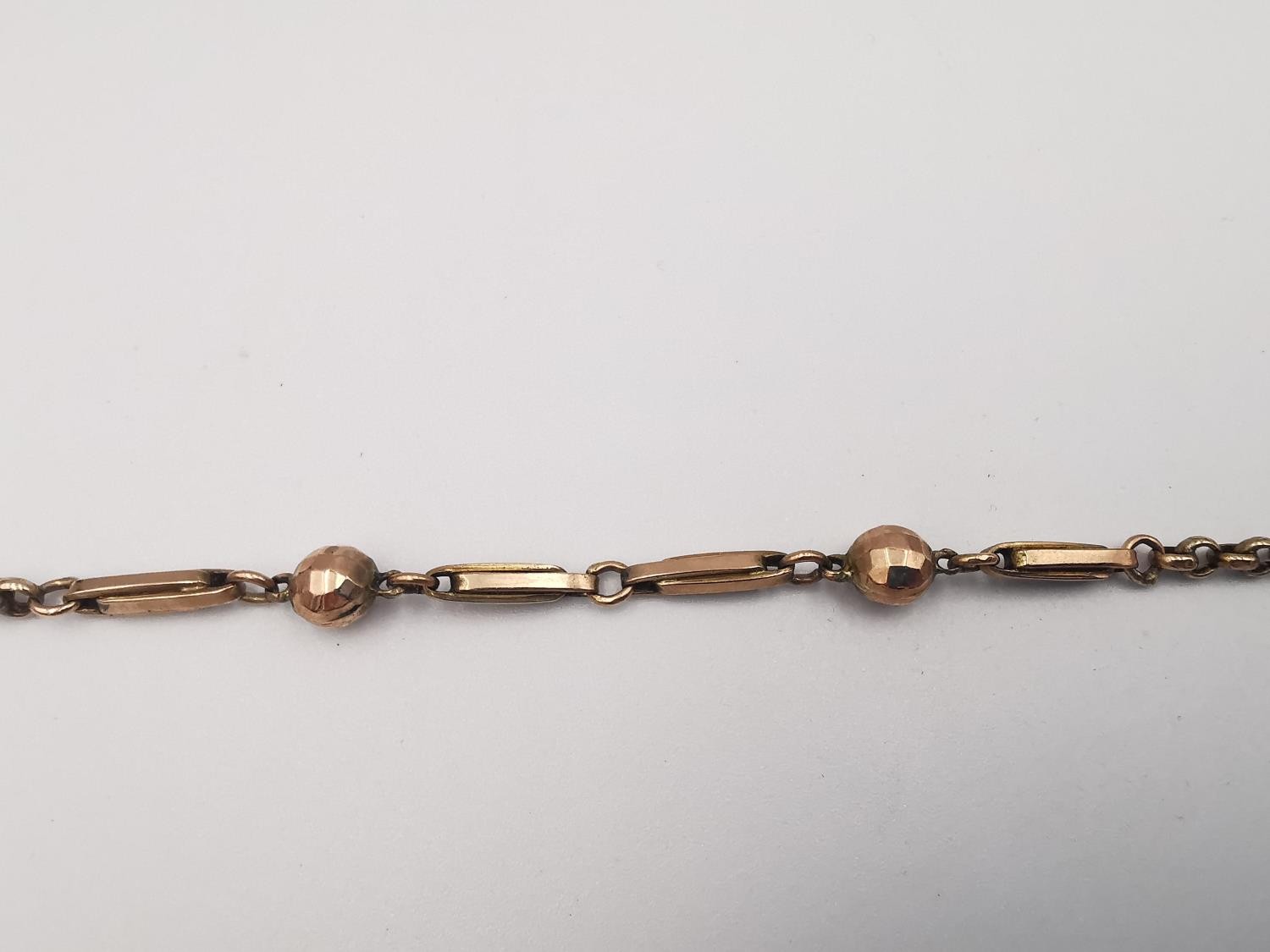 A Victorian 9ct rose gold chain with ball and bar design to the front, the rest of the chain rolo - Image 3 of 5