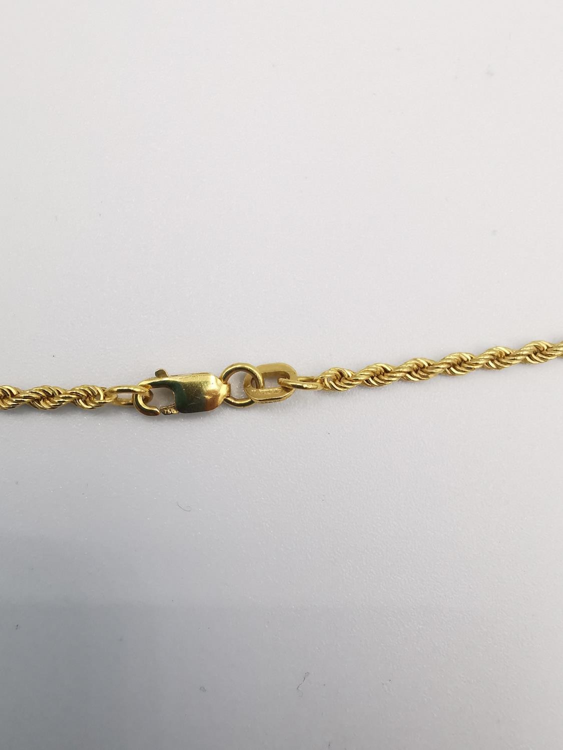 An 18ct yellow gold twist rope chain with lobster clasp. Hallmarked:18KT, Italy, 750. L.64cm - Image 4 of 5