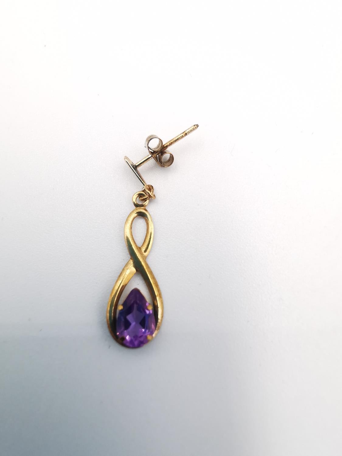 A 9ct rose gold and amethyst pendant with chain and earrings set. The infinity design pendant set - Image 8 of 8