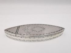 A George III sterling silver navette shaped toothpick holder with chased floral motifs, diamond