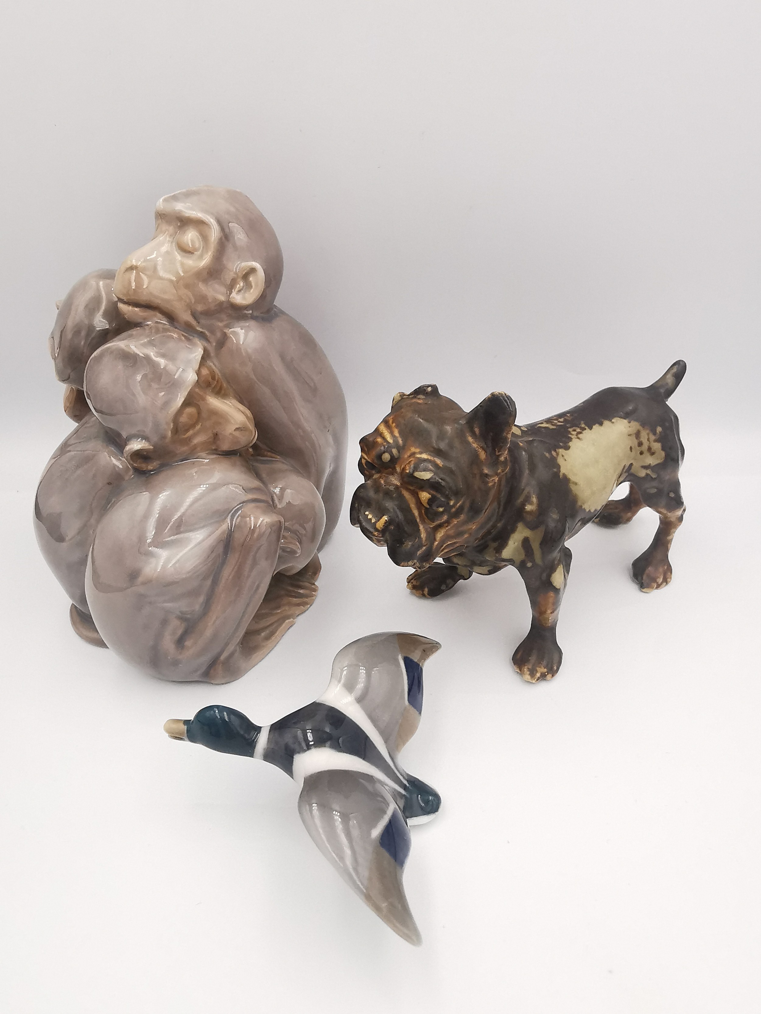 Bing and Grondahl, 1581 porcelain monkey family along with a stoneware bulldog and a Royal