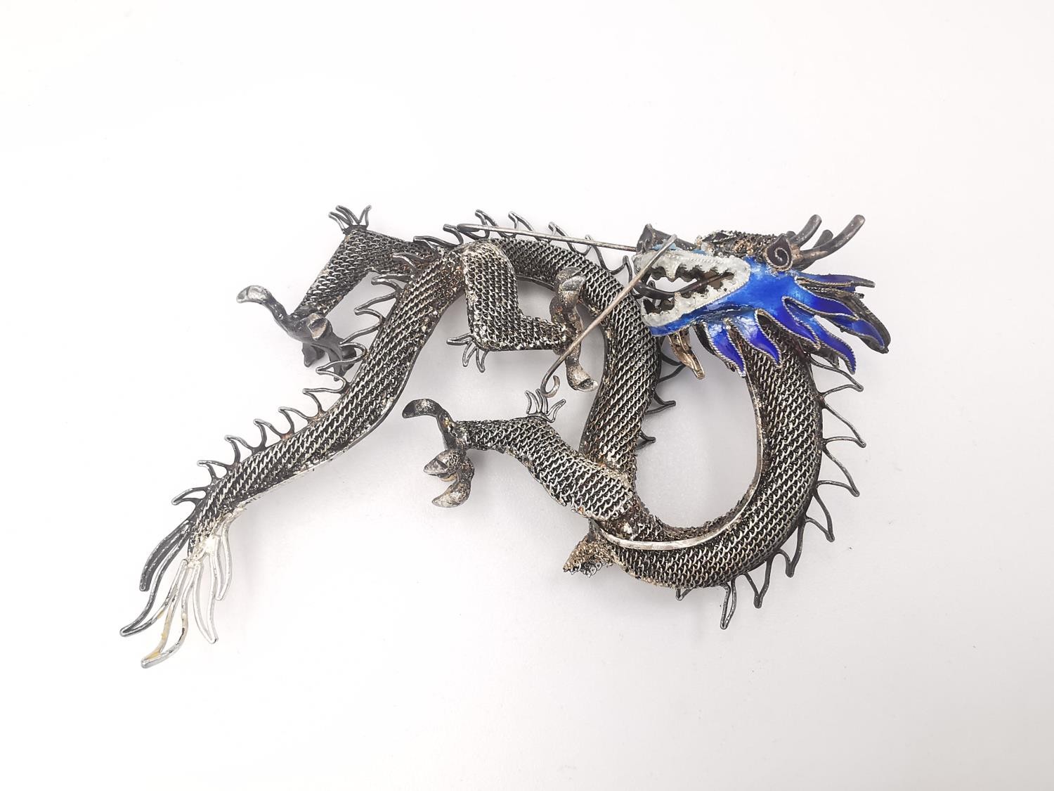 Two mid 20th century Chinese enamel and white metal filigree wirework dragons. Decorated with pale - Image 4 of 5