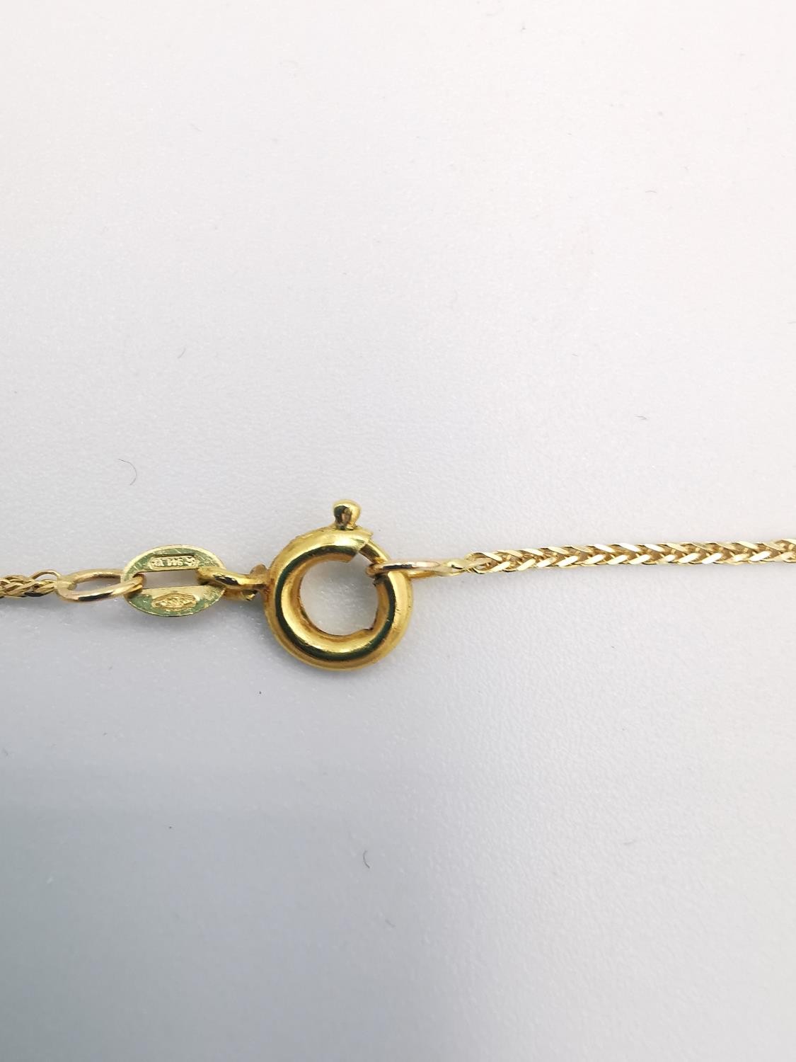 A boxed 18 carat yellow gold pendant by Zolotas and 14ct chain. The pendant in the form of a - Image 5 of 5