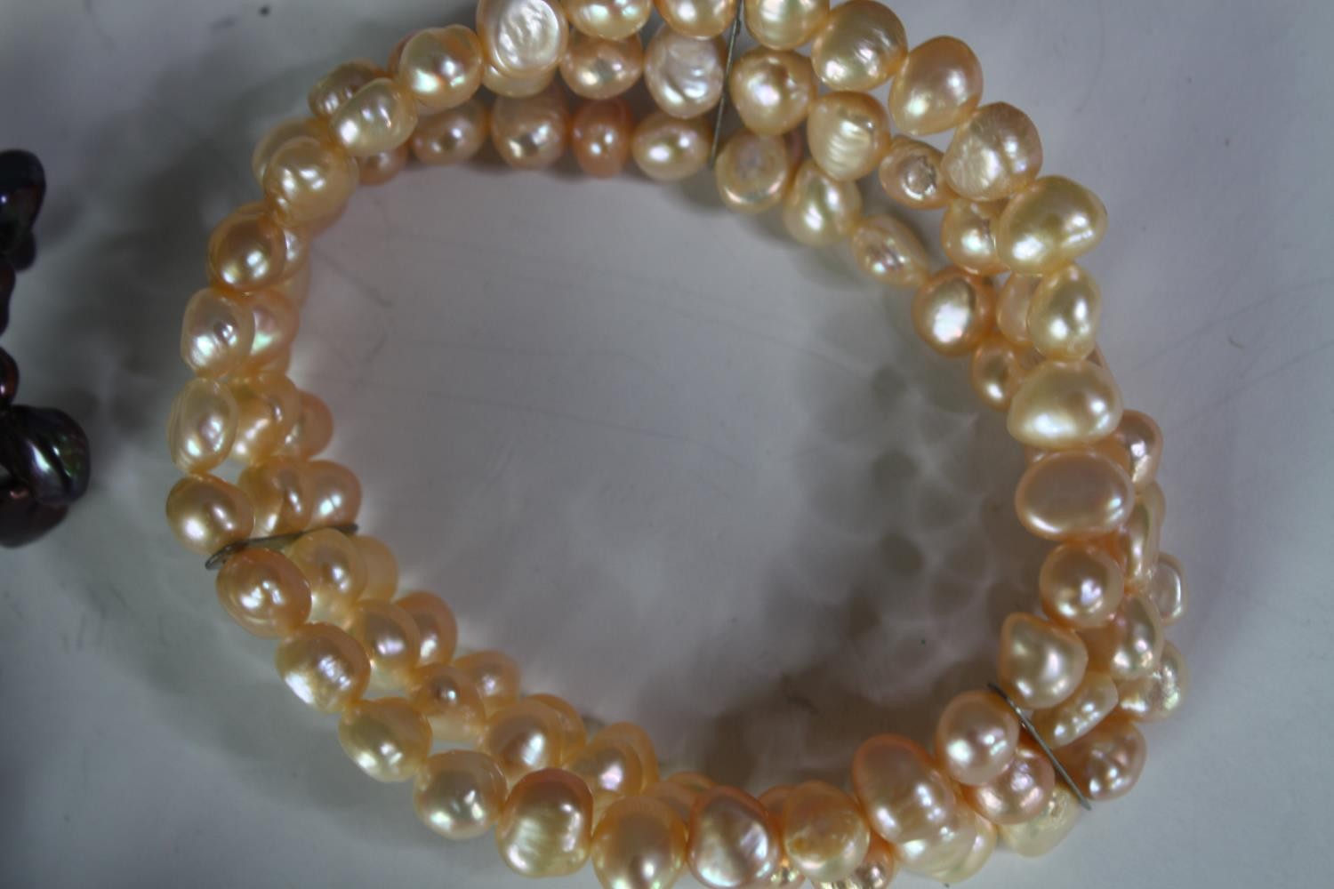 A collection of six cultured pearl elasticated bracelets of various designs, including a grey - Image 2 of 6