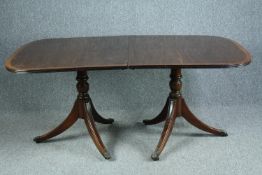 Dining table, Georgian style mahogany and crossbanded with satinwood string inlay. Twin pedestal