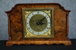 Mantle clock in walnut case. Pyke & Sons. An Elliot Clock. Mid 20th century. H.14.5 W.22 D.7cm.