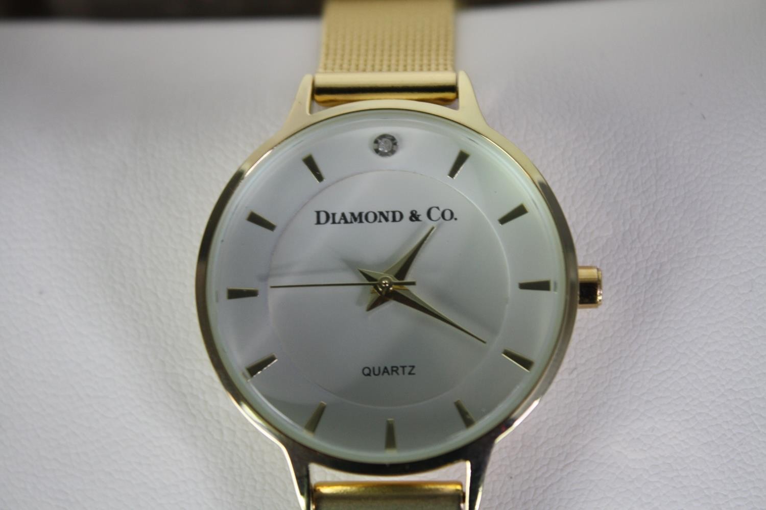 A boxed Diamond and Co ladies quartz watch with gold tone mesh strap and white dial. Box and papers. - Image 4 of 4