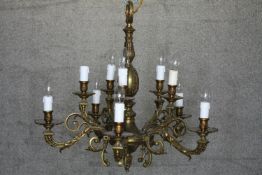 A ten branch French chandelier with foliate design. Gothic style. H.60 Dia. 66cm.