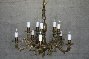 A ten branch French chandelier with foliate design. Gothic style. H.60 Dia. 66cm.