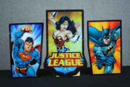 Three superhero panels designed to be backlit. Superwomen, Superman and Batman. H.72 W.46 cm. (
