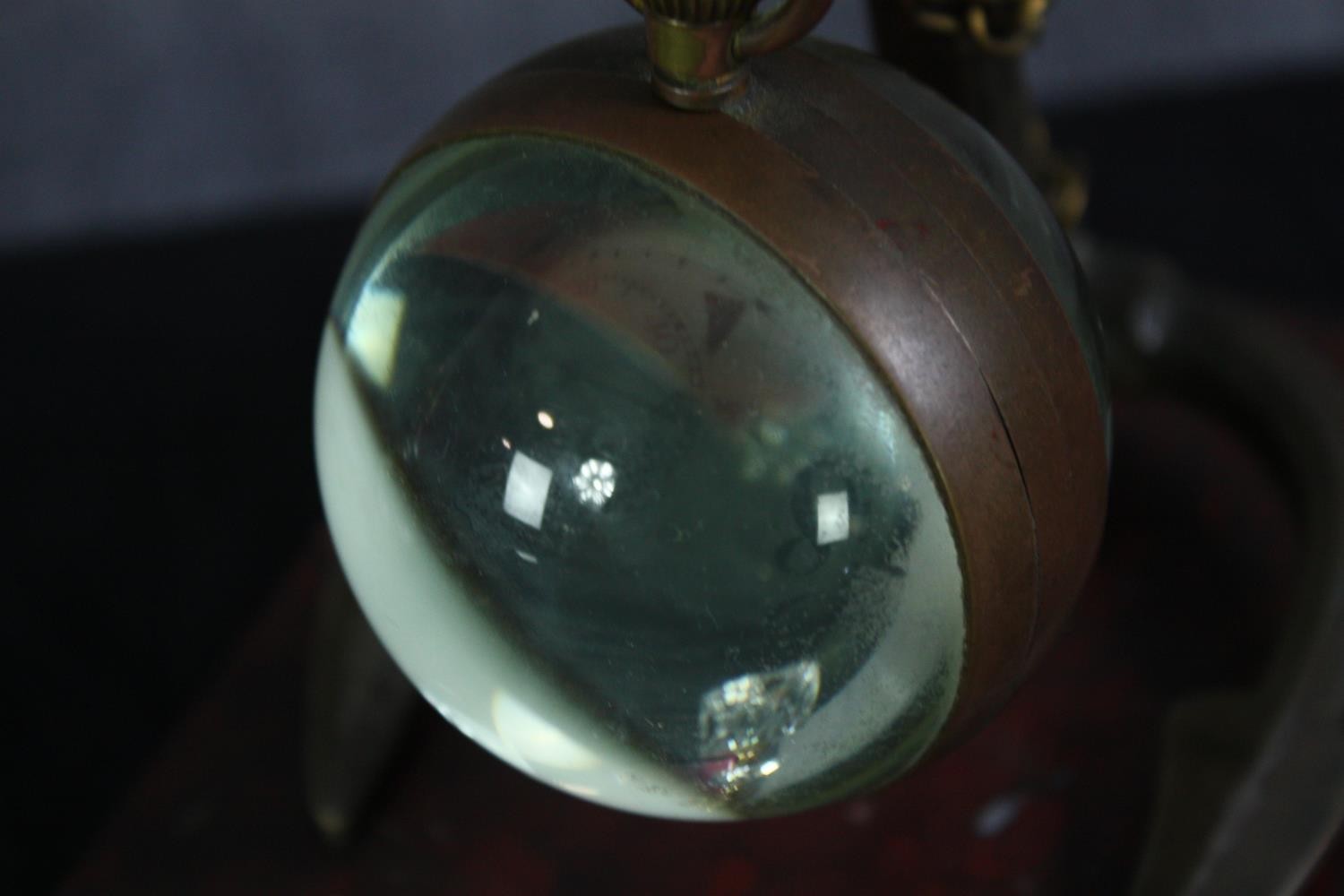 A glass ball suspended by an anchor. The glass ball would once have held a clock. Not present. Also, - Image 6 of 6