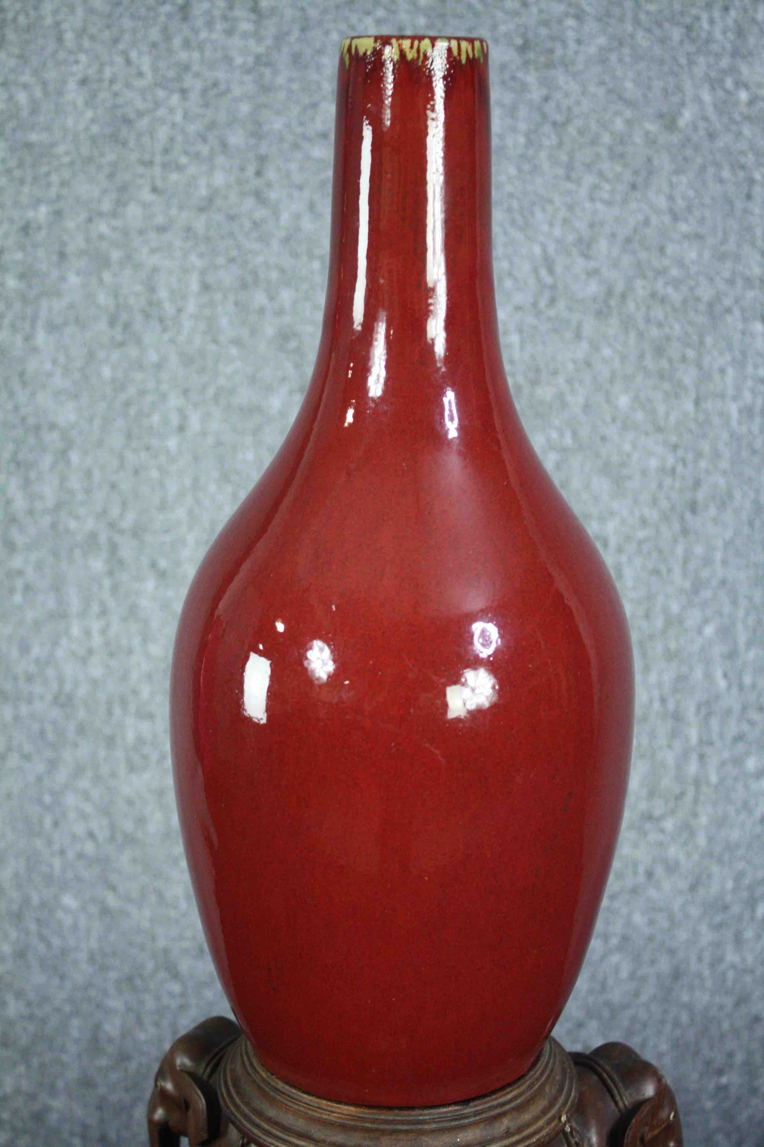 A Chinese flambe glaze bottle vase on a carved raised elephant stand. The stand is made up of - Image 2 of 6