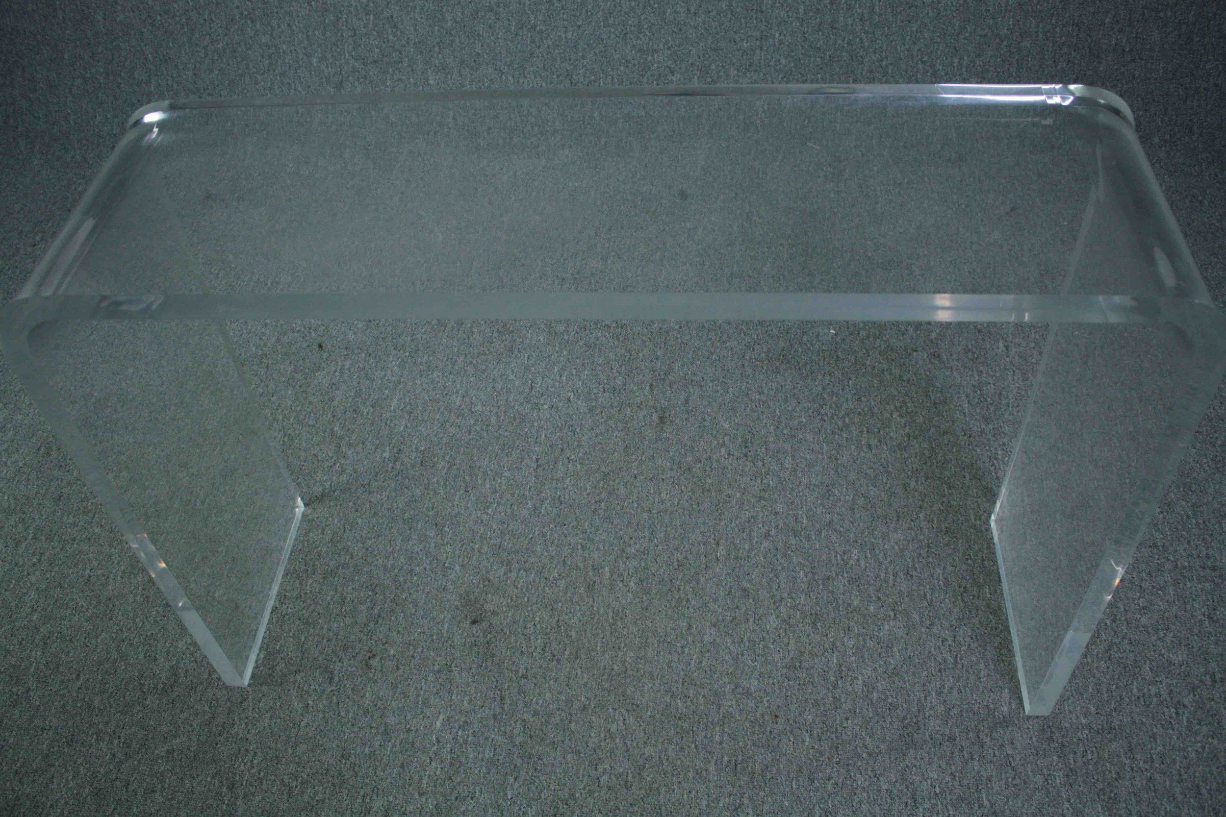 A contemporary lucite console table. H.73 W.108 D.32cm. - Image 4 of 5