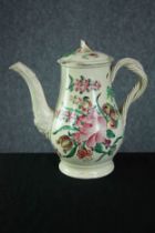 An 18th Century Creamware coffee pot and cover, circa 1780, with floral painted decoration and twist