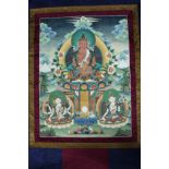 A large Tibetan Buddhist wall hanging. Fabric. Thangka. H.150 W.100 cm.