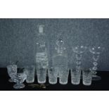 A collection of cut glass and crystal, including a crystal decanter, six crystal drinking glasses