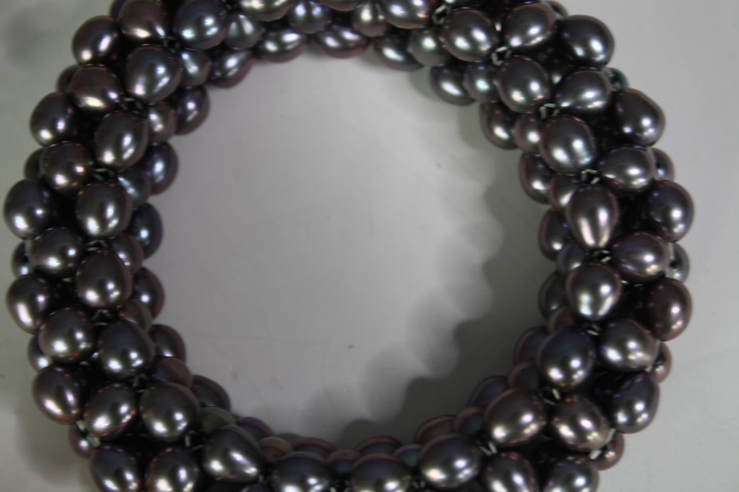 A collection of six cultured pearl elasticated bracelets of various designs, including a grey - Image 3 of 6