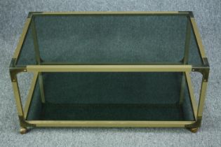 Coffee table, metal framed with smoked glass. H.38 W.82 D.49cm.