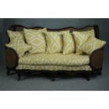 Bergere sofa, mid century mahogany framed in the French Provincial style, reupholstered and with