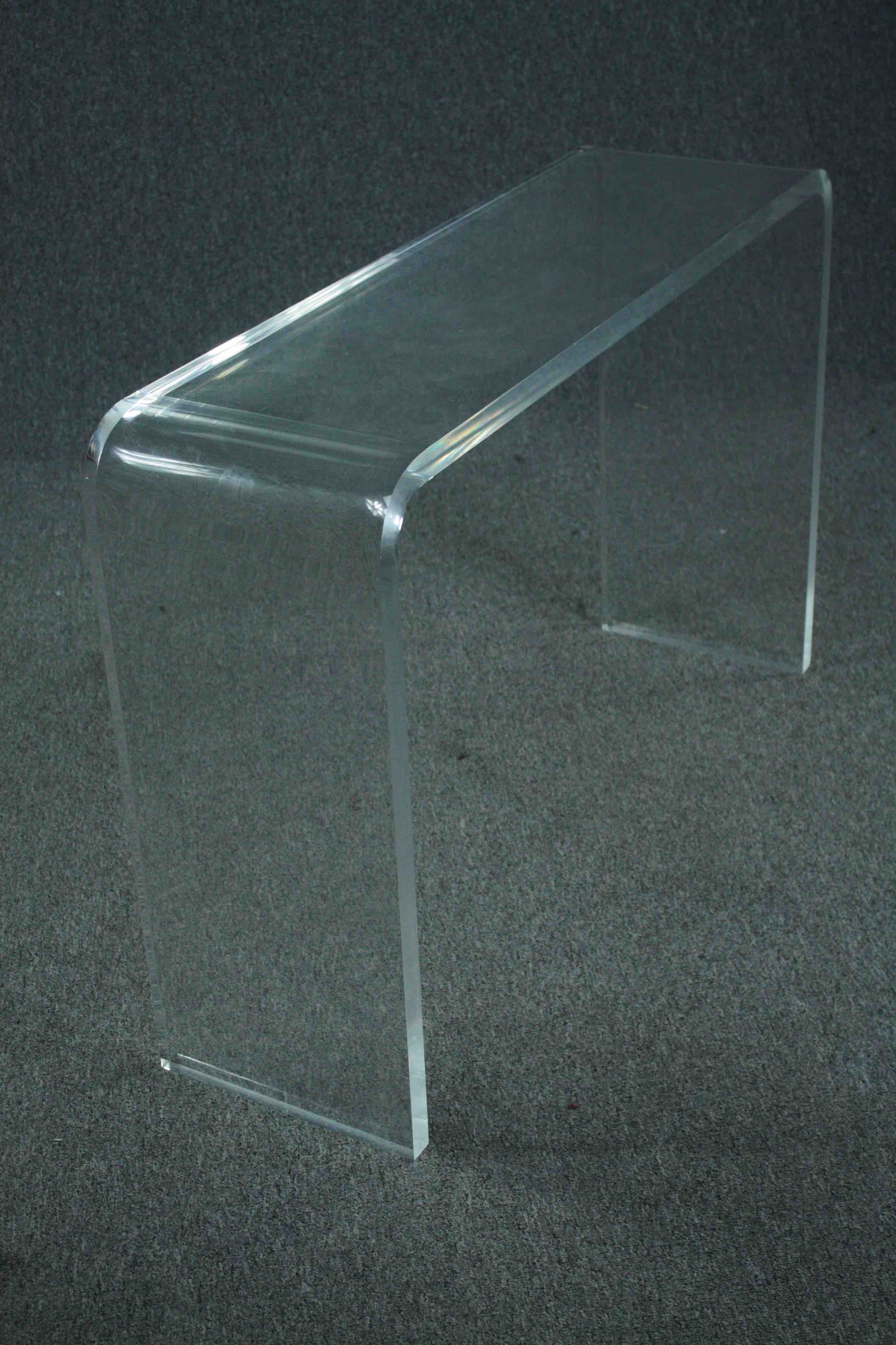 A contemporary lucite console table. H.73 W.108 D.32cm. - Image 2 of 5