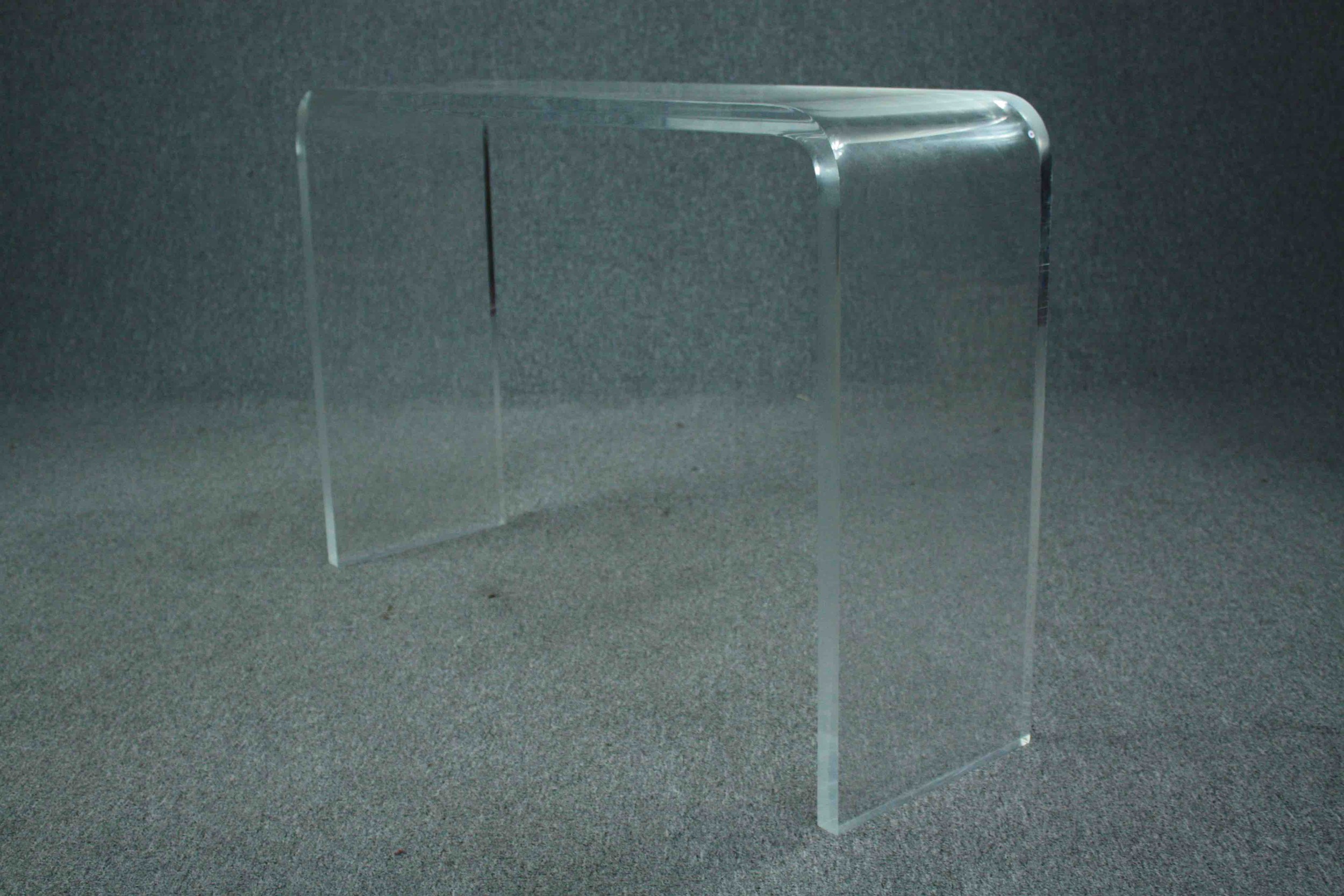 A contemporary lucite console table. H.73 W.108 D.32cm. - Image 3 of 5