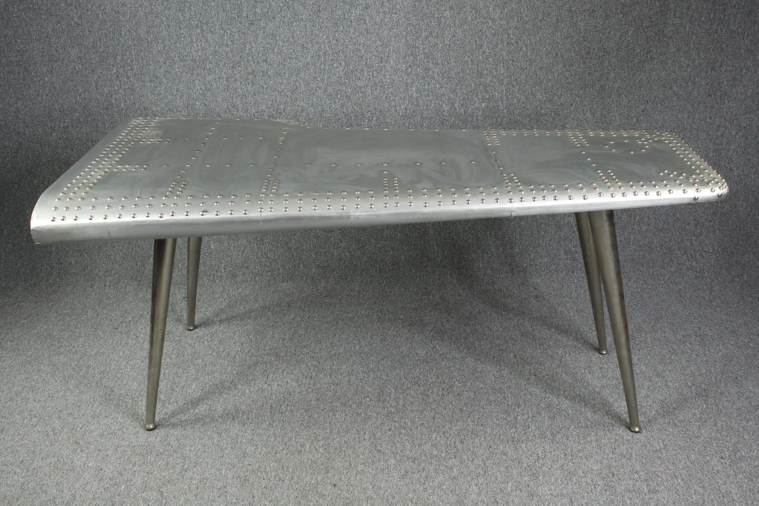 Writing desk, Aviator airplane wing style polished aluminium. H.75 W.170 D.93cm.