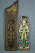 Two carved Buddhist wall panels hand painted and decorated in gilt. H.143 W.35 cm. (largest)