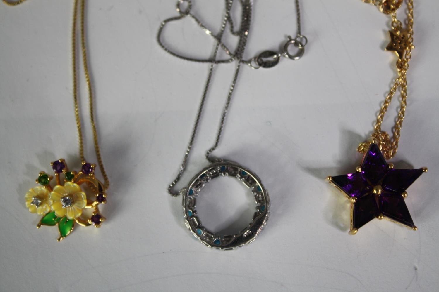 A collection of five silver and gold plated silver pendants and chain, set with various gemstones. - Image 3 of 4