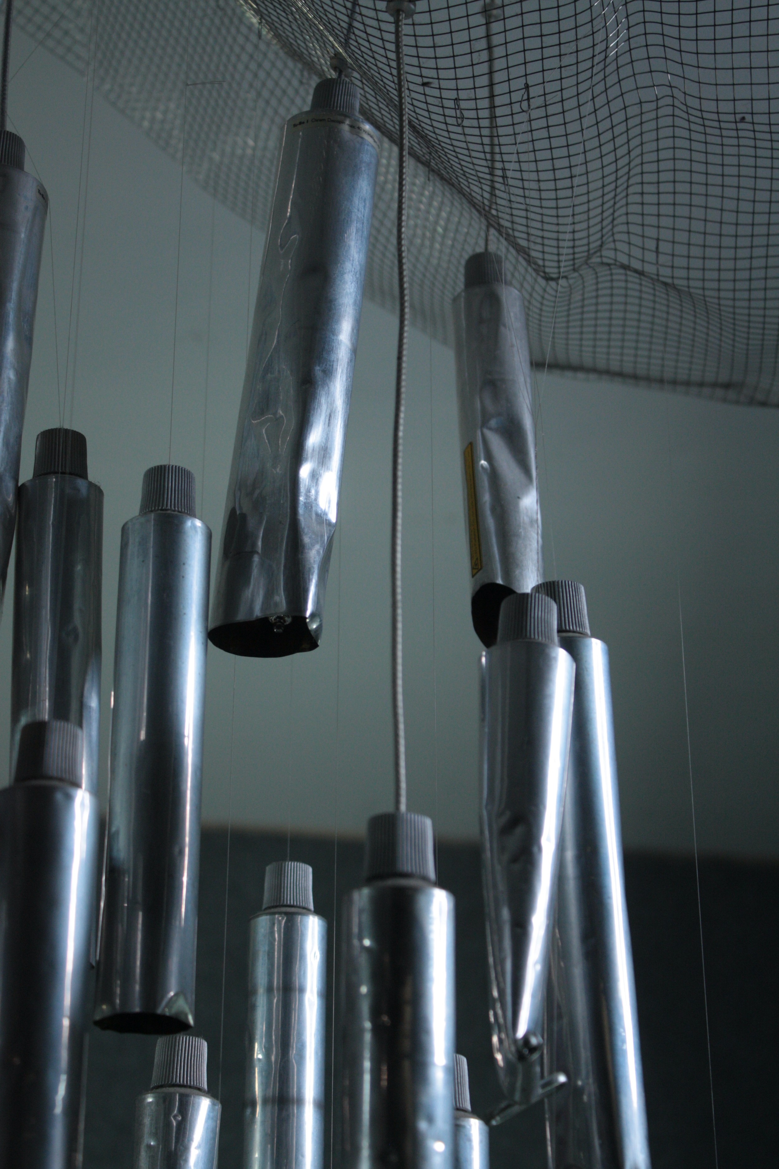 The Tu-Be 1, Ron Arad for Ingo Maurer. Hanging ceiling light. Multiple empty tubes of pallet paint - Image 3 of 5