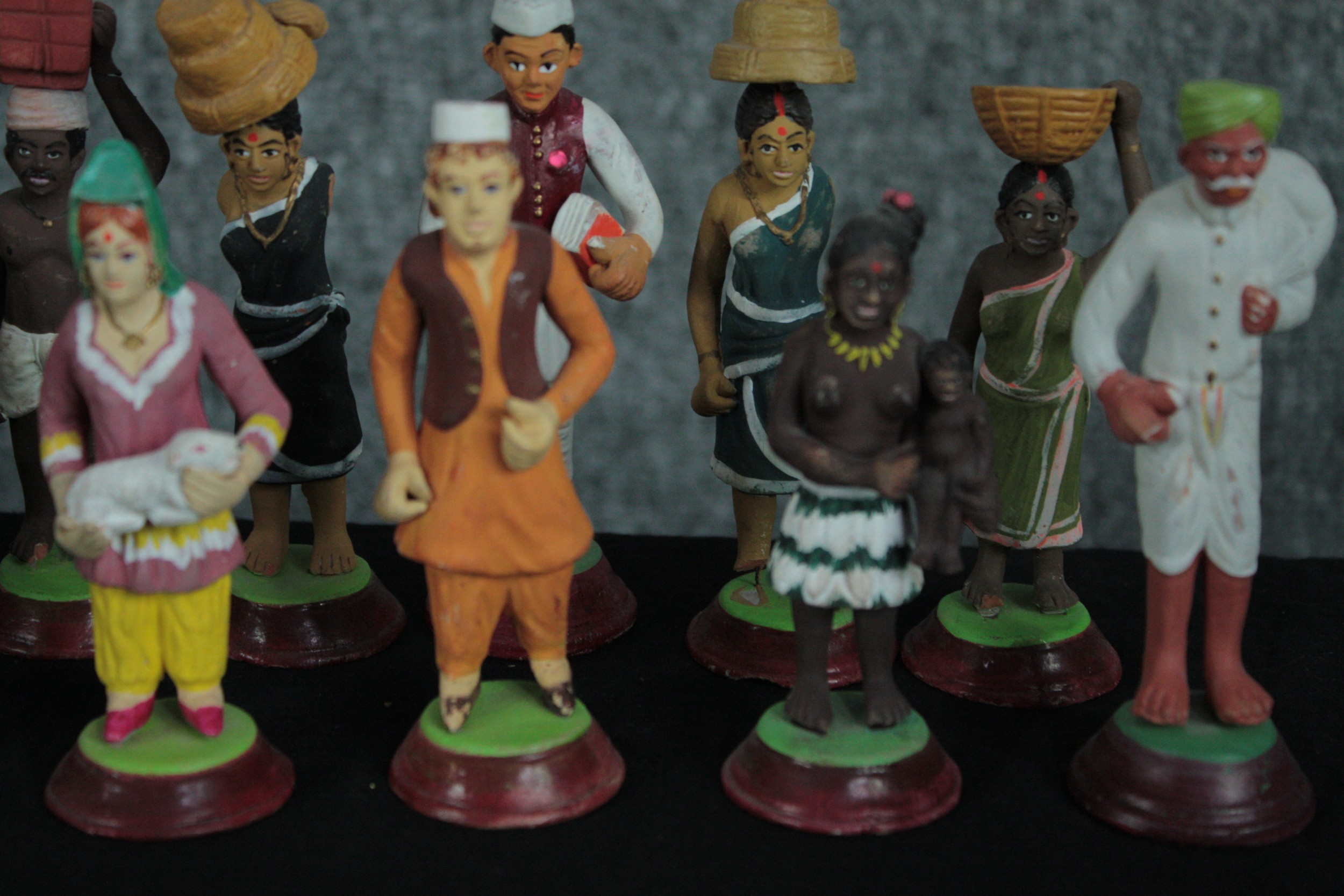 An eclectic mix of twenty two ethnic characters. Hand painted and cast in plaster. H.12cm. (largest) - Image 5 of 6