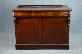 Chiffonier, mid 19th century flame mahogany with inset tooled leather top. H.95 W.122 D.53cm.