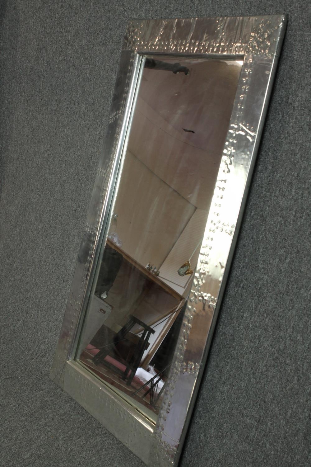 A vintage industrial style studded and metal framed pier mirror. H.130 W.76cm. - Image 2 of 4