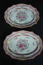 A pair of Chinese 18th century export ware platters with floral design and gilded detailing.