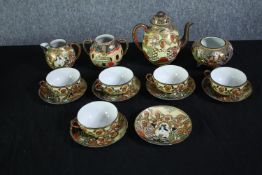 A late 20th century Japanese egg shell tea set. Incomplete. With a teapot, sugar bowl, creamer, five