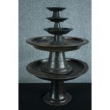 Five wooden stands. Probably Chinese and twentieth century. Aged and nicely worn. H.28 Dia. 49cm. (