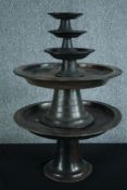 Five wooden stands. Probably Chinese and twentieth century. Aged and nicely worn. H.28 Dia. 49cm. (