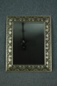 Wall mirror, silvered frame with bevelled plate. H.79 W.63cm.