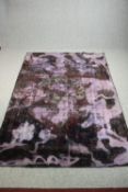 A contemporary Eastern carpet, faux distressed. L.280 W.180cm.
